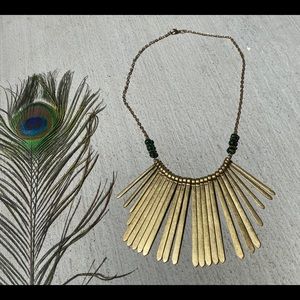 Metal sun flare necklace with wooden beads